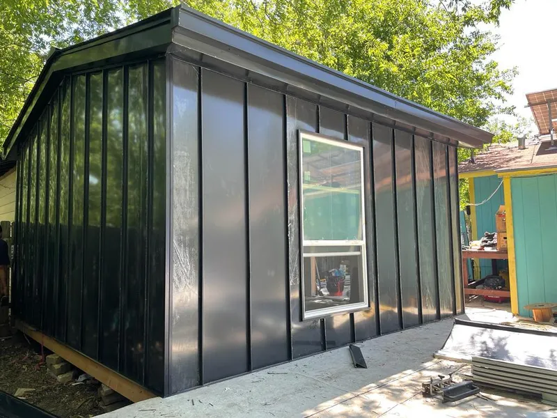 Black standing seam metal wall panels for Metal Roof Installation in Cairo